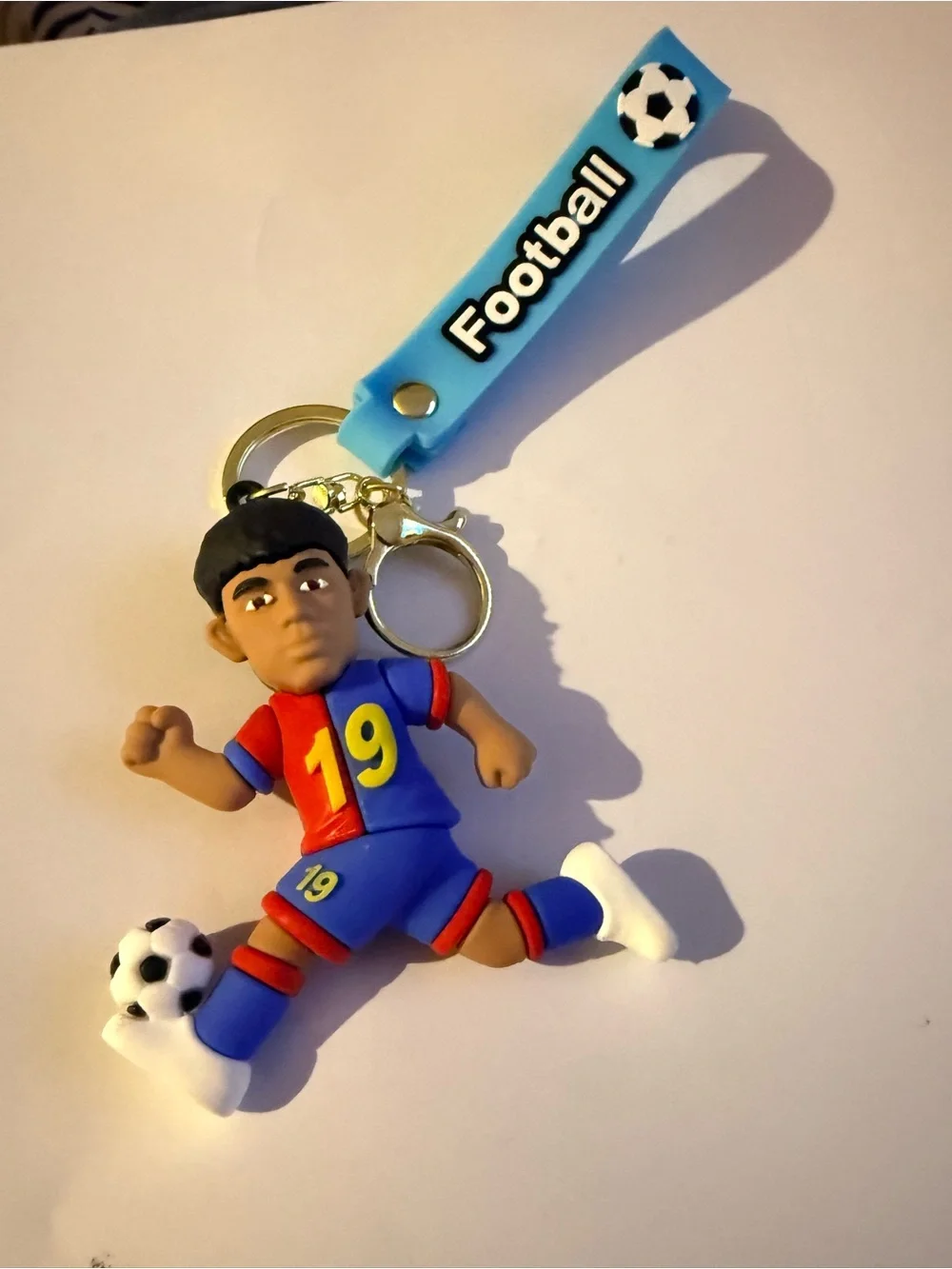 Red, yellow, blue Soccer Player Keychain. - Football Strap Accessory